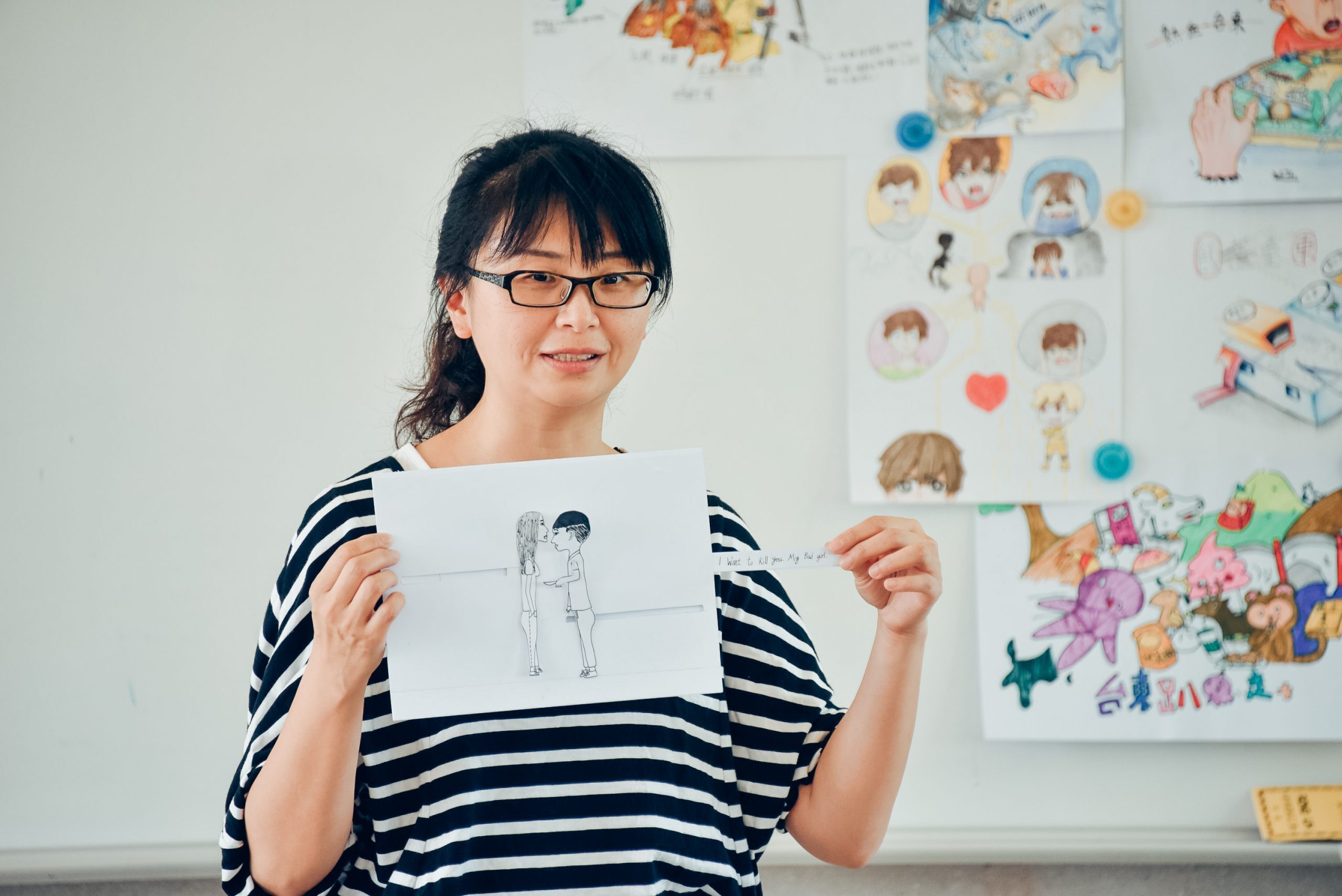 許懷之教師著條紋衣服個人照