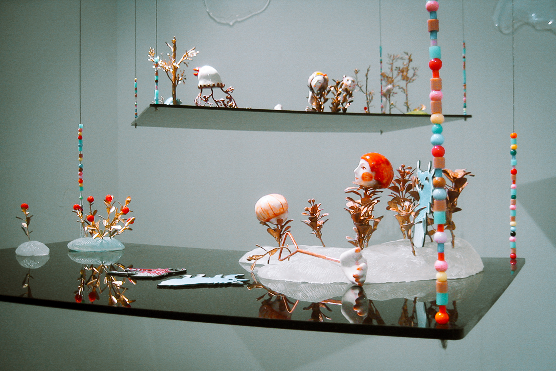 李真所製作的金工作品《後花園》